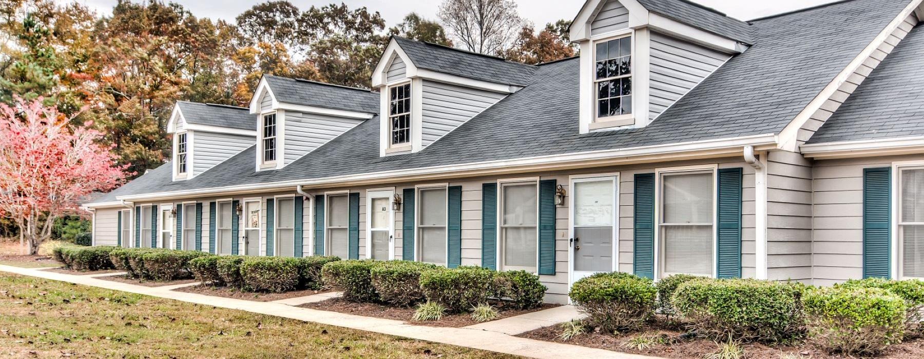 a house with blue shutters